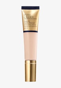 Estee Lauder Futurist Hydra Rescue fugtgivende makeup i en blød lyserød tube med guldaccents, med SPF 45, slankt design og glat tekstur.