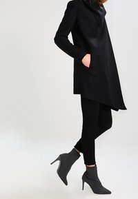 AllSaints Klassischer Mantel - black