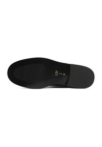 Black shoe sole with a smooth finish and textured grip pattern. Features embossed size markings in gold. Minimalistic design with a rounded shape.