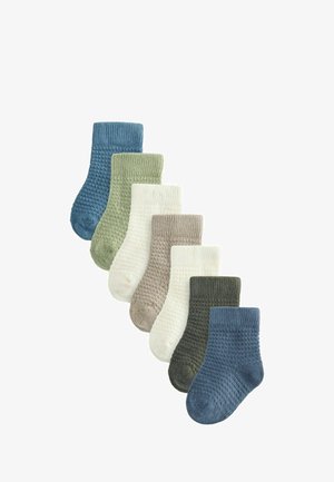Set di sei paia di calze in cotone lavorate a maglia in vari colori: blu, verde, bianco, beige, grigio e verde scuro. Cuffie a costine e motivi texture.