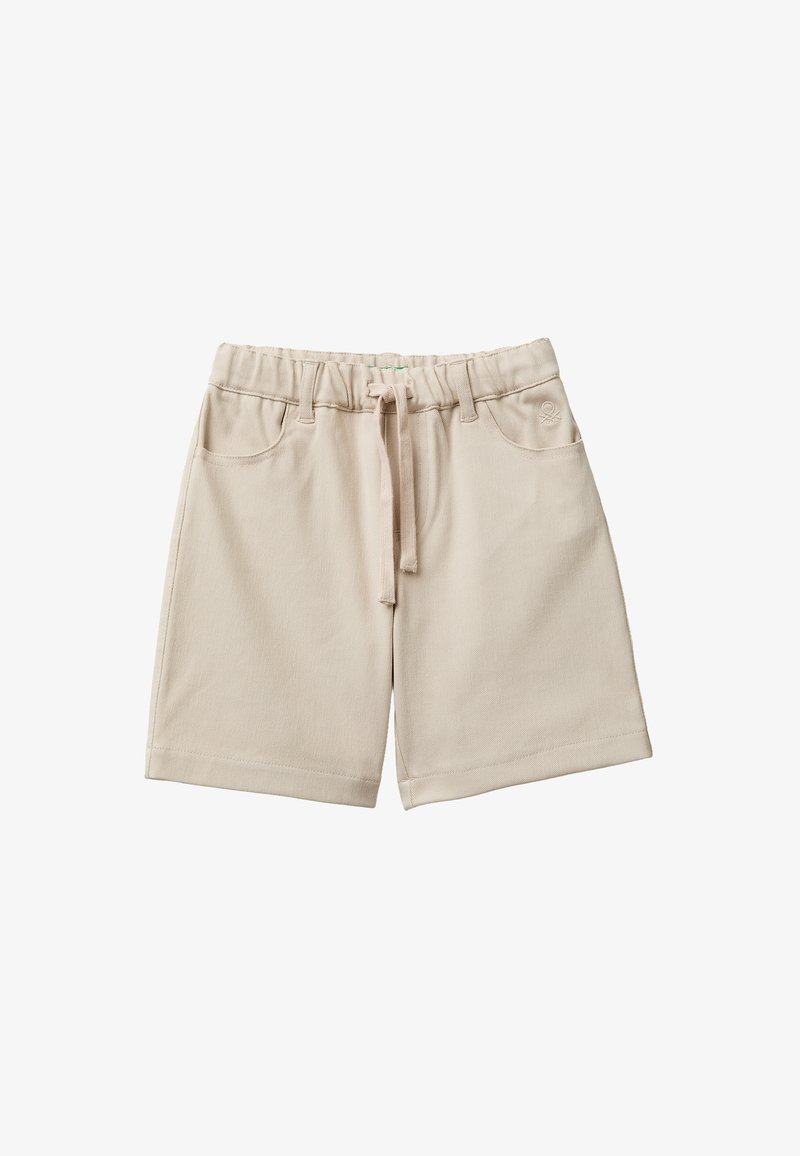 Beige knee-length shorts with elastic waistband, drawstring, front pockets, and small embroidered logo on right pocket.