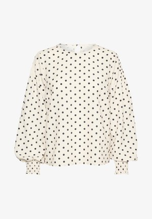 Kreemja blouse mustritega mustade ringidega, ümmargune kaelus, silmadega tagakinnitus ja puffse varrukad volditud mansettidega. Pehme puuvillasegune kangas.