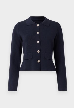 Tumedat sinine pika varrukaga kudumiskardigan, millel on kuus kuldset dekoratiivnuppu ja kaks esi-taskut klappidega.