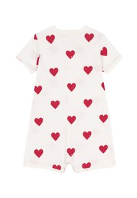 Λευκό ολόσωμο φορμάκι με κοντά μανίκια και διακεκομμένα κόκκινα σχέδια καρδιών. Μαλακό βαμβακερό ύφασμα, στρογγυλή λαιμόκοψη και κουμπώματα στο κάτω μέρος για εύκολη ένδυση.