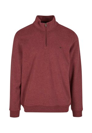 Bordo flis pulover z visokim ovratnikom, pol zadrgo in rebrastimi manšeti. Ima majhen logotip na prsih. Mehka struktura, sproščen kroj.