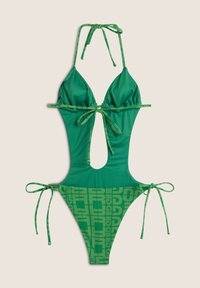 Vihreä bikinitoppi, jossa on kolmiomaiset kupit, leikatut yksityiskohdat, solmittava kaulanyöri ja selkäosan nauhat. Alaosassa on logokuviointi ja sivunauhat.