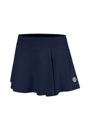Donkerblauwe geplooide sportrok met brede elastische tailleband en klein wit rond logo aan de onderkant rechts.