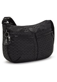 Black nylon shoulder bag with embossed geometric pattern, two front zip pockets, and a decorative charm. Adjustable strap for comfort.