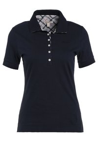 Polo bleu marine à manches courtes avec une patte de boutonnage et une doublure intérieure à carreaux au niveau du col.