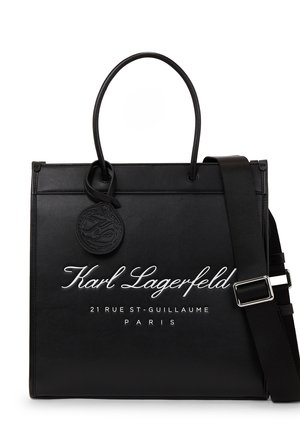 Sort Karl Lagerfeld tote-taske med top-hanke, aftagelig skulderrem og logo med adresse på fronten.