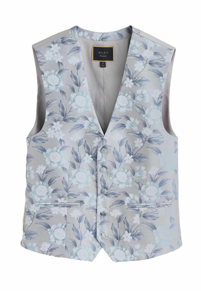 Lichte grijze bloemenprint vest, met blauwe en witte bloemen. De stof heeft een gladde textuur, met twee voorzakken en vijf knopen.