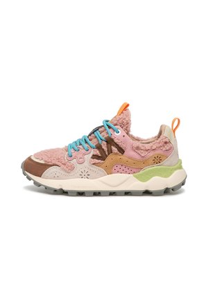 Multicolored sneaker featuring pink, brown, and cream materials, textured fabric, blue laces, green sole accents, and a distinctive design.