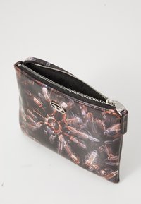 Black zippered clutch with a glossy finish featuring a detailed spider graphic; includes a silver hardware accent and textured interior.