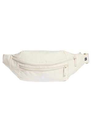 Sac banane en tissu couleur crème avec deux compartiments zippés et une sangle réglable, avec un logo discret Adidas trefoil à l'avant.