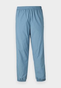 XH8909_SKB - Pantalones deportivos - limestone
