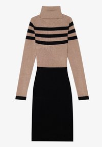Strickkleid mit einem Rollkragen, langen Ärmeln mit schwarzen Streifen und einem figurbetonten schwarzen unteren Teil. Aus einem weichen, strukturierten Material gefertigt.