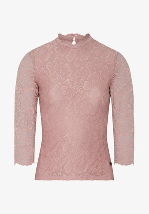 Haut en dentelle rose clair avec un col montant et des manches trois-quarts. Présente des motifs floraux et un détail en trou de serrure au niveau de l'encolure arrière.