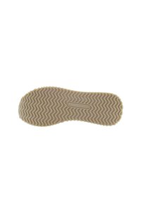 Talpă de pantof din cauciuc bej cu un model de striații ondulate. Prezintă un eticheta logo rectangulară aproape de centru. Textură netedă în ansamblu.