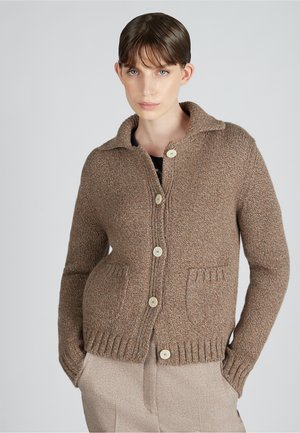 Brown knit cardigan with a collared neckline, five cream buttons, two front pockets, and ribbed hem. Textured yarn offers a cozy appearance.