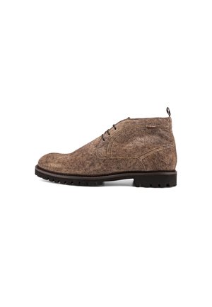 Brown suede ankle boot with black laces and thick black rubber sole, shown from left side on white background.