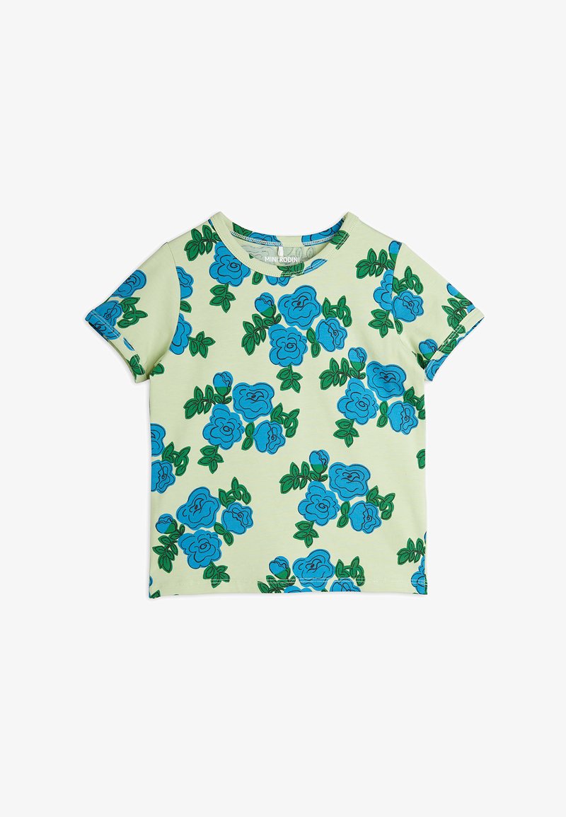 Īsām piedurkņu T-krekls, gaiši zaļā krāsā, ar zilu rozes rakstu un zaļām lapām. Mīksts audums, apaļa kakla izgriezums un izšūtas malas.