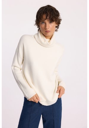 - Sweter