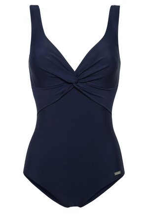 Tamsiai mėlynas vientisas maudymosi kostiumėlis su sukimu priekyje, plačiais petnešomis ir lygiu paviršiumi. Šone yra mažas metalinis logotipas.