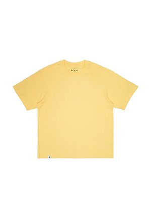 T-shirt a maniche corte e colletto rotondo in morbido cotone giallo chiaro. Presenta una vestibilità dritta e un'etichetta piccola attaccata all'orlo laterale.