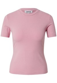 T-shirt rosa a maniche corte con scollatura rotonda. Realizzato in tessuto morbido, presenta una vestibilità slim e una leggera texture su tutta la superficie.
