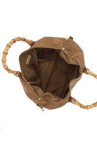 Braune Lederhandtasche mit Bambusgriffen, Reißverschluss und glatter Oberfläche. Das Innere verfügt über ein einzelnes Fach mit einem weichen Futter.