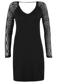 Robe noire longueur genou avec décolleté en V et manches longues en dentelle transparente ornées de motifs floraux complexes.