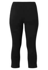 Sort capri-bukser, tætsiddende design, lavet af strækbart stof, har to baglommer, minimale syninger, glat tekstur, cropped længde.
