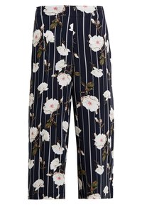 Blommiga culotter i marinblått med vertikala vita ränder. Har stora vita blommor med gröna blad, mjukt tyg och lös passform.