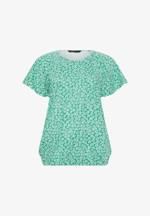 Blusa verde a maniche corte con motivo floreale di margherite bianche e scollo rotondo, caratterizzata da un orlo largo leggermente arricciato.
