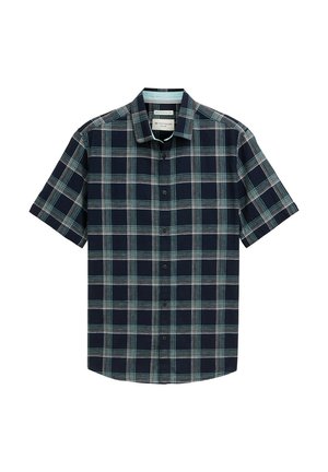 Short-sleeve, button-up shirt in navy with a light blue and white plaid pattern. Features a collar and a straight hem. Light fabric texture.