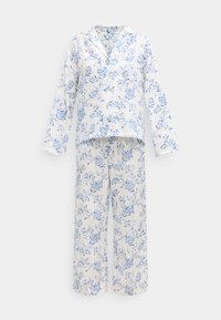 Ensemble de pyjama à motif floral en tissu léger. Le haut est doté d'un col, de boutons et de manches longues. Le pantalon est ample avec le même imprimé.