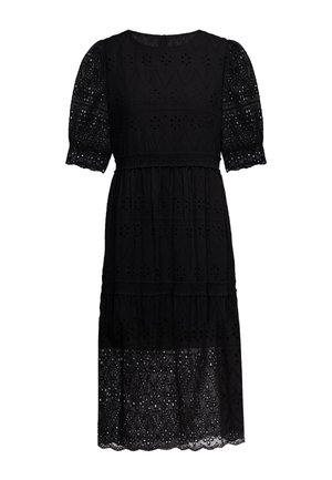 Black midi dress with eyelet lace fabric, short puff sleeves, a round neckline, and tiered skirt with scalloped hem.