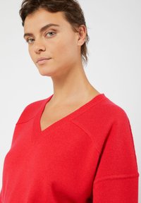 Rodier V-NECK IN 4-THREAD - Trui - corail