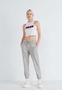 GAP HERITAGE - Jogginghose - light heather grey