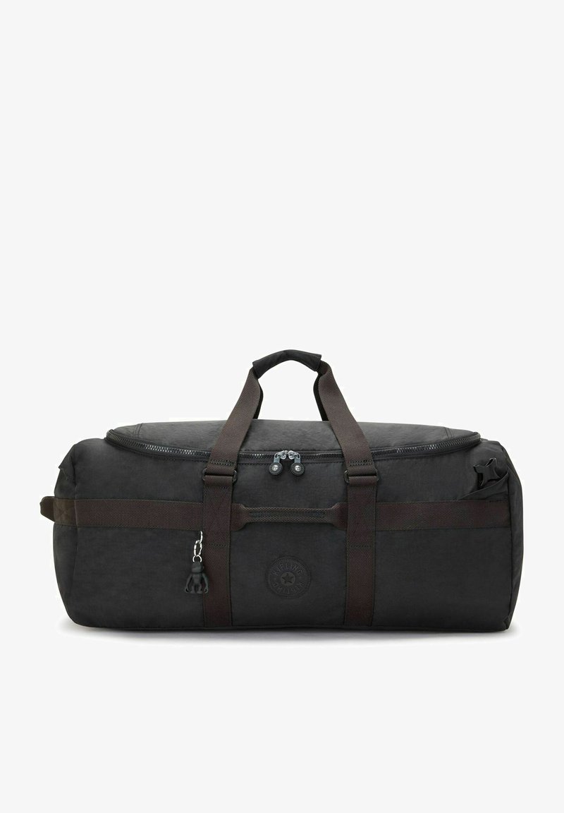 Sac de sport noir en tissu durable, doté de doubles poignées de transport, d'une fermeture éclair et d'un patch logo rond sur le côté. Accents marron foncé.