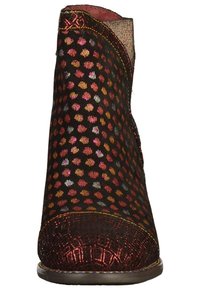 Bottines en tissu noir avec un motif à pois multicolores, bout arrondi, accents texturés et surpiqûres décoratives le long des bords.