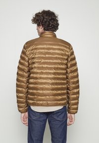 Tommy Hilfiger PACKABLE - Casaco leve - desert khaki