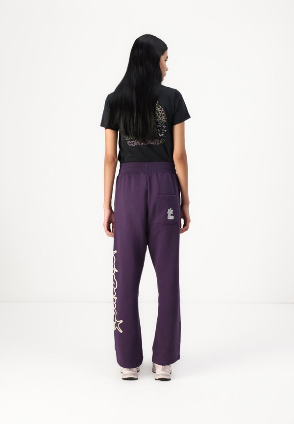 STARLIGHT PANTS WOMAN - Tracksuit bottoms - purple3