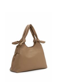 Tan leather handbag with tied handles, soft texture, slouchy shape, and a rounded top opening. Minimalist design with no visible hardware.