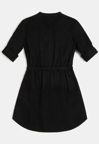 Svart klänning med trekvarts lång ärm som är uppvikt, elastisk midja och en slät textur. Lång, rundad fåll i botten.