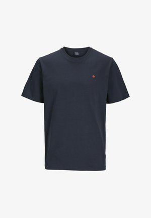 Námornícko modré tričko vyrobené z bavlny, s okrúhlym výstrihom, krátkymi rukávmi a malou červenou bodkou na hrudi. Hladký povrch.