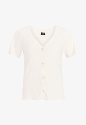 Cardigan blanc côtelé à manches courtes avec col en V et quatre boutons devant, étiquette de taille visible à l'intérieur du col.