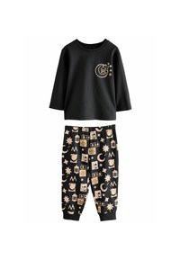 Schwarzes Baumwoll-Pyjama-Set bestehend aus einem Langarmoberteil mit einem grafischen Motiv eines Halbmonds und gemusterten Hosen mit himmlischen Designs in Creme und Gold.