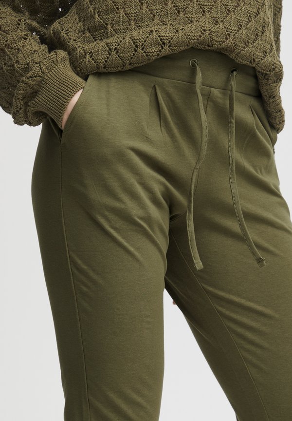 BYPANDINA - Tracksuit bottoms - burnt olive4