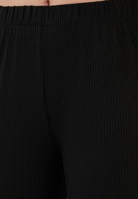 LELA REGULAR FIT - Hlače - black